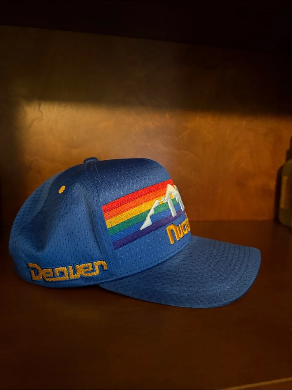 Mitchell & Ness Blue Snapback Hat with Yellow Embroidery and Red Strap